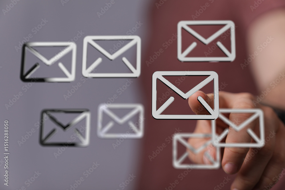Fototapete efficient email management. concept image showing digital email icons and a hand interacting.