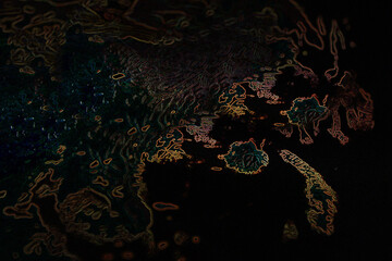 Abstract background showing glowing contours resembling a topographic map or an aerial view