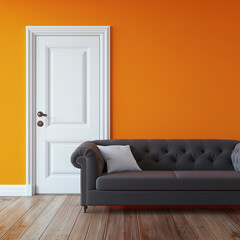 A sophisticated black tufted sofa with a single white cushion contrasts sharply with a vivid orange wall and a pristine white door. The warm wooden flooring adds a natural touch to the bold, modern de
