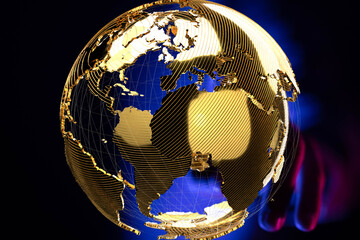 Stunning image of a golden globe, symbolizing global connectivity and international business.