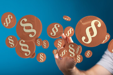 3D render of paragraph symbols floating near a hand.  Perfect for legal, law, or justice concepts.