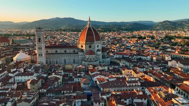 Drone view of Florence cathedral at sunset, capital of Tuscany region in Italy, Duomo Cathedral of Santa Maria del Fiore, famous renaissance Italian landmark