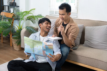 Travel Planning and Fun. A couple enthusiastically brainstorming ideas for their trip.