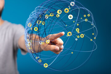 Abstract image of a hand interacting with a digital sphere representing global network connections.