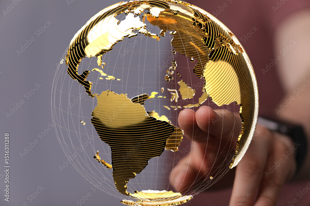Leinwandbilder abstract image of a hand interacting with a golden globe, symbolizing global connections and network