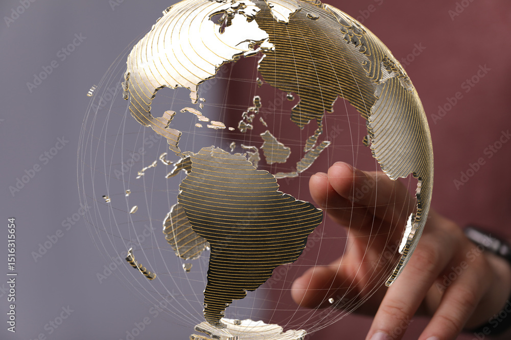 Poster abstract image of a hand interacting with a digital globe, representing global connections and netwo
