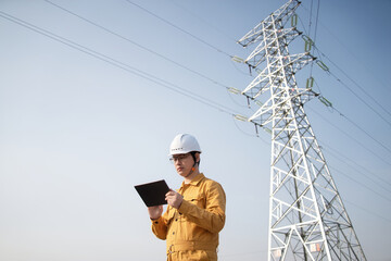 asian male civil engineer work power line