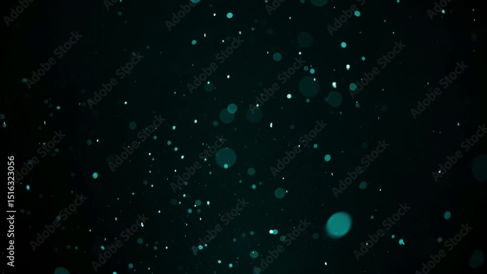 Poster teal particles floating in dark background