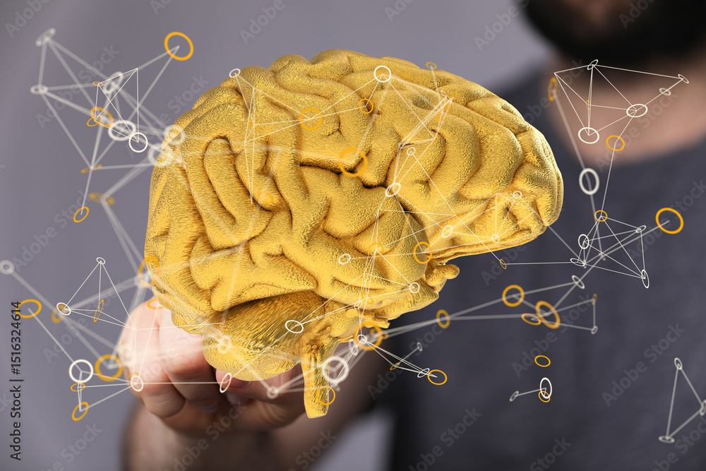 Poster Image of a golden brain model with network connections, representing intellect and neural pathways.