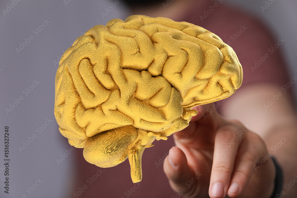 Poster Conceptual image of a golden brain,represents intelligence, creativity, and problem-solving.