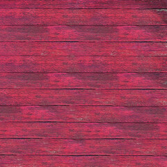 Weathered pink wooden boards showing a rustic background texture