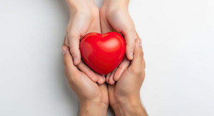 Gentle hands sharing a vibrant red heart symbolizing love care and compassion