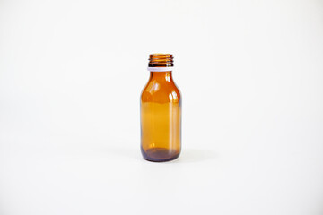 glass pill bottle isolated on white