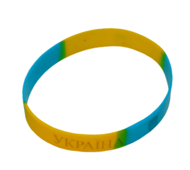 Silicone wristband in blue and yellow with “Україна” engraving, symbolizing Ukrainian patriotism. Isolated on white or transparent background.