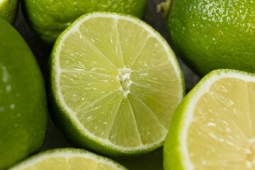 Fresh lime fruit halves close-up
