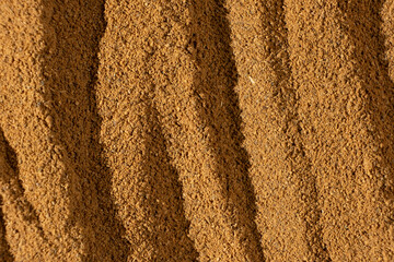 Fine Brown Ground Cinnamon. Culinary Background.