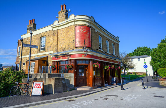 Rotherhithe, London, UK - Aug 11 2021: The Angel pub in Rotherhithe. The Angel is a traditional British public house. It is on Bermondsey Wall East on the banks of the River Thames in London.