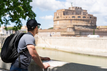A young adventurous man, enjoying the beauties of Rome.