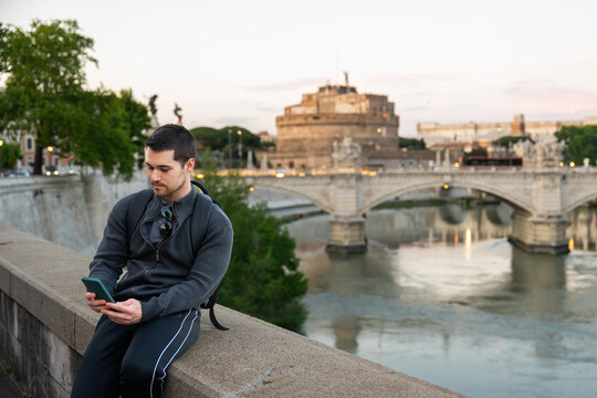 A young adventurous man, enjoying the beauties of Rome.