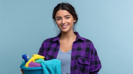 Cheerful Young Woman Smiling While Holding Basket of Cleaning Supplies
