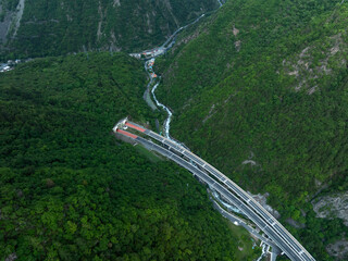 Aerial view of  beautiful forest mountain and highway landscape