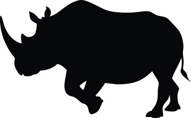 Powerful black silhouette of a rhinoceros charging forward on a white background vector design.
