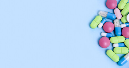 lots of pills and medications highlighted on a blue background