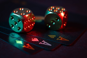 Playing cards and dices. Gambling concept. Dark background