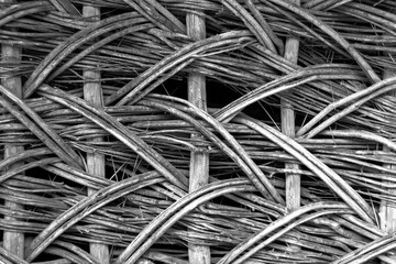 Abstract vine texture. The texture formed by the interweaving of thin vine rods. Template for interior design, websites or promotional materials. Horizontal image.
