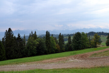 Tatra Mountains panorama. Beautiful view from Kotelnica mountain. Bialka Tatrzanska, Podhale, Poland. High Tatra summits.