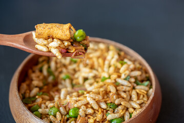 A bowl of rice with a spoon in it