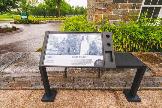 Informational sign titled Silent Witness describes the Lockkeeper's House and its historic role.