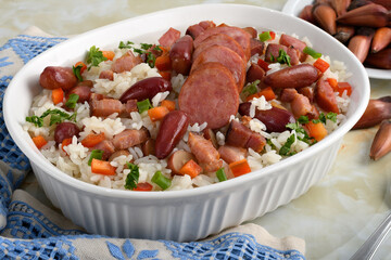 A delicious Brazilian dish of rice with sausage, bacon and pine nuts
