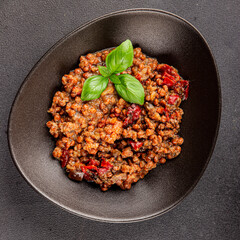 Lentil dish vegetables and roasted peppers savory vegetable fresh vegetarian and vegan food gourmet food background on the table rustic food top view copy space keto and paleo diet