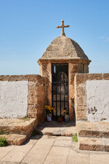 Watchtower with image of Virgin of Guadalupe on the San Carlos walls in Cádiz, Spain