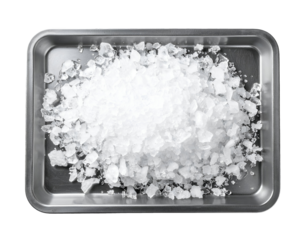 top view of crushed ice pile on stainless steel tray for food chilling or beverage preparation on isolated background
