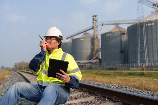 Engineers are checking the working system of a fresh food factory producing ducks, chickens and pork outside the building.