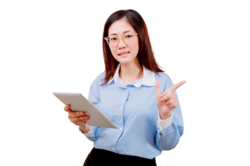 Asian young beautiful woman in glasses and a striped shirt holds a tablet and gestures with her hand.