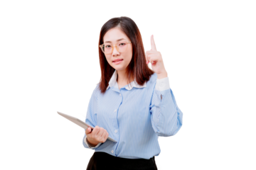 Asian young beautiful woman in glasses and a striped shirt holds a tablet and raises her index finger, appearing to make a point or share an idea.
