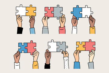 A Variety of Hands Skillfully Holding Different Puzzle Pieces for Meaningful Collaboration