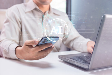 A person using a smartphone and laptop with a digital AI interface overlay.