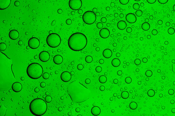 Close-up macro bubbles of green drink,Closeup of bubbly green soda with refreshing carbonation