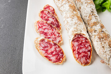Dry-cured sausage pork meat smoked food fresh delicious gourmet food background on the table rustic...