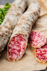 Dry-cured sausage pork meat smoked food fresh delicious gourmet food background on the table rustic food top view copy space