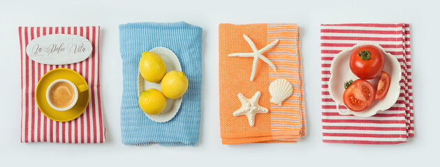  Mediterranean trendy summer concept with coffee cup, lemons, tomatoes and seashells on striped towels isolated on white background. Top view, flat lay