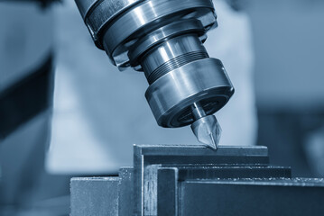 The chamfering process on NC milling machine with chamfer tools in the light blue scene.