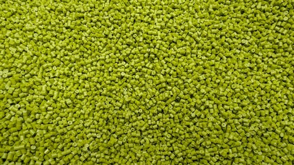 Pile of Green Plastic Pellets, Raw Material, Polymer, Manufacturing, Industrial, Texture
