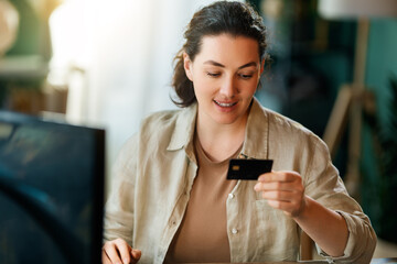 Woman is doing online purchases