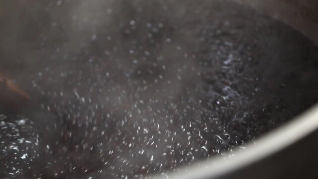 Red beans boiling in a large pot