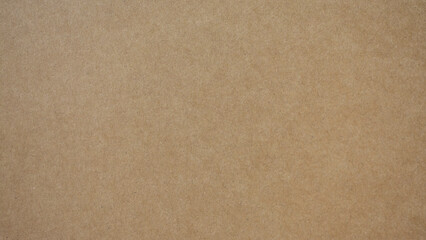 Abstract pattern of rough beige cardboard, Old paper sheet, Background is brown kraft paper or cardboard texture.